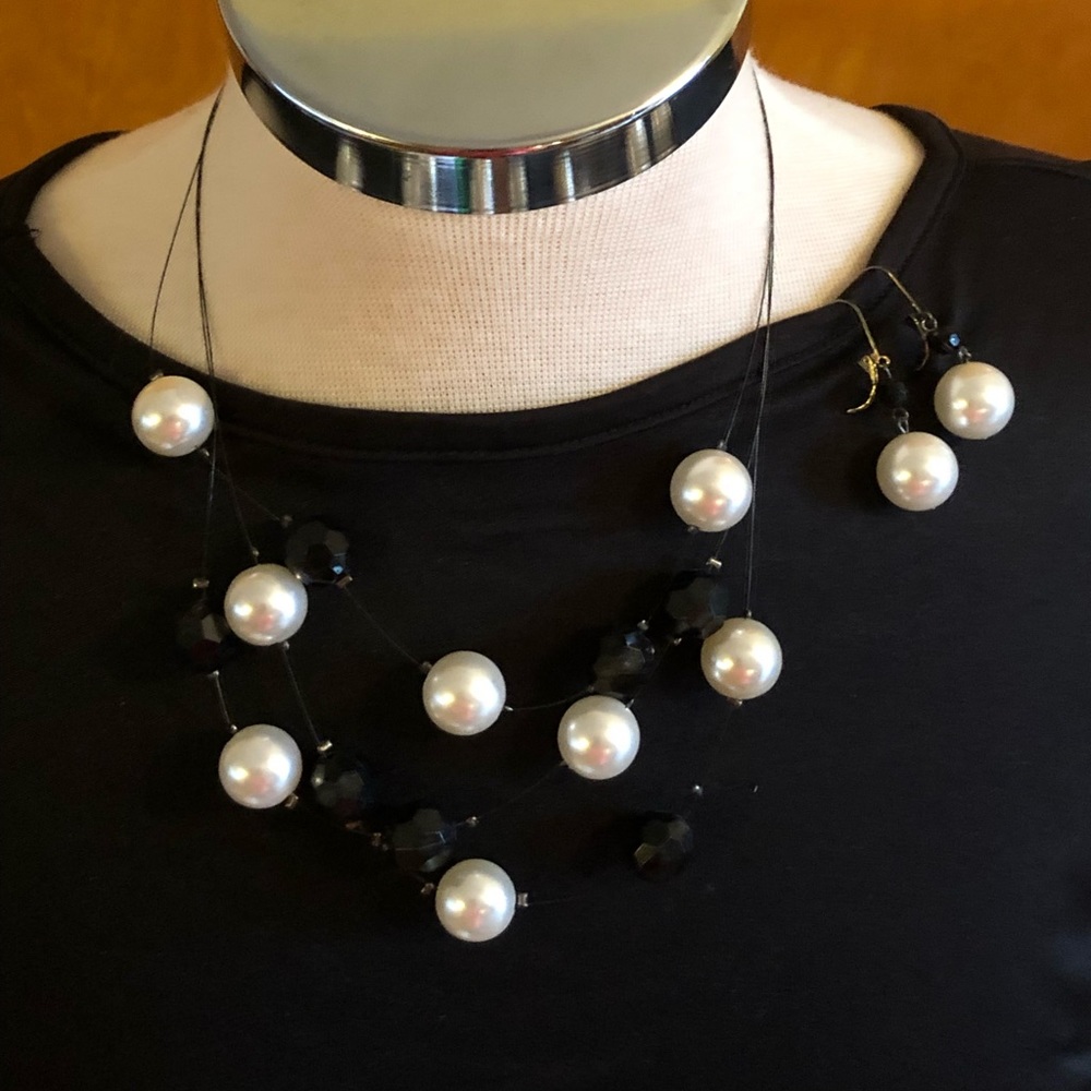 White pearl black bead floating necklace